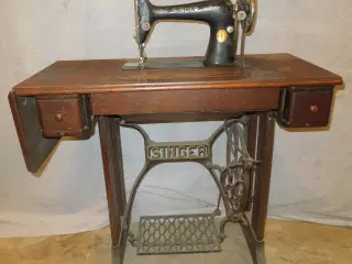 Symasking Singer og tøjrulle