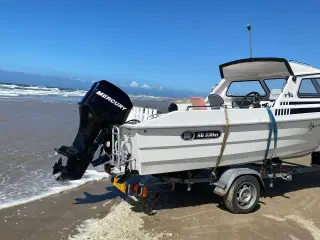 Kabine/speedbåd med trailer el.hal