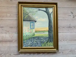 Hjørne af hus, nyere billede i gammel billedramme