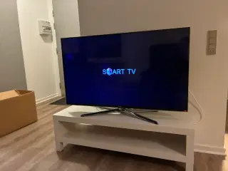 Samsung smart-tv med fod og bord