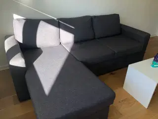 Sovesofa i grå stof 