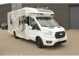 2022 - Chausson Titanium 716   Fantastisk delintegreret autocamper med el. sænkbar køjer i bag.og sænkbar dobbeltseng i front, 170 HK og Automatgear