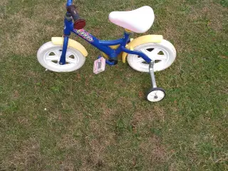 Lille børnecykel med støttehjul sæde højde 40 cm.