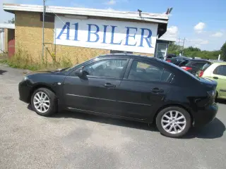 Mazda 3 1,6 Touring+