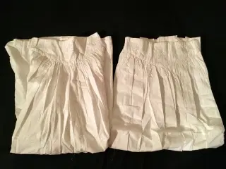To stk hvide nederdel til salg