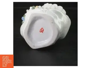 Porcelænssvane med blomsterdekoration (str. 22x9 cm)