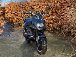 PGO PMX NAKED med Carbon skjolde