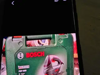 Bosch stiksav med batteri og oplader med kuffert.