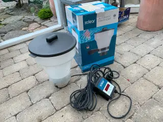 Foderautomat til havedam