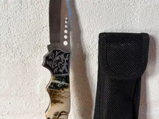 Jagtkniv med sort hylster