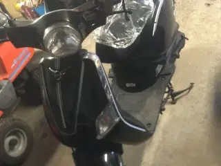 En super fint mc scooter 125cc