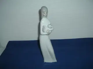 Figur. Dame med kat. Porcelænsfigur