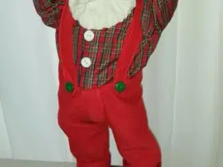 Julemand der synger og danser når man går forbi