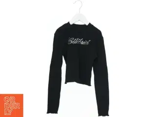 Langærmet sort bluse med tekst fra H&M (str. 140)
