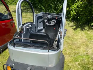 Cargo Elkabinescooter i grå med skader 