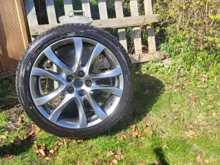 Originale 19 tommer alufælge med næsten nye dæk