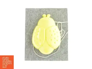 Natlampe formet som en bille