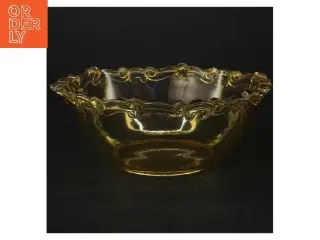 Skål i gulligt glas med dekorative kanter (str. Ø 22 cm)