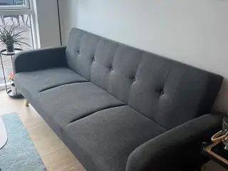Sovesofa i fin stand
