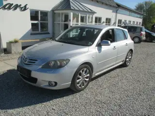 Mazda 3 2,0 Touring+