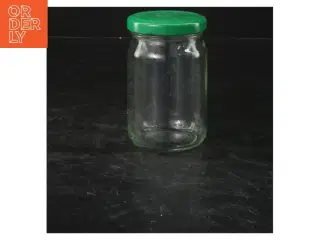 Glasbeholder med grøn låg (str. 10x6 cm)