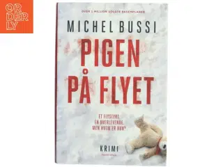 Pigen på flyet : krimi af Michel Bussi (f. 1965) (Bog)