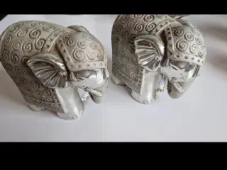 Sølv elefanter og krukker