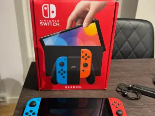 Nintendo Switch OLED inkl. 4 spil