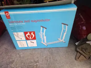 Toiletstativ med magasinholder