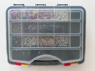 Dobbeltsidet kuffert med forskellige perler