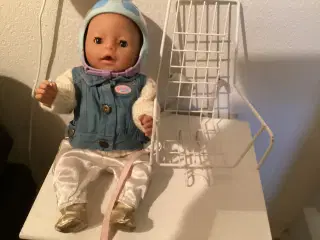Baby Born  dukke med cykelstol samt cykelhjelm 