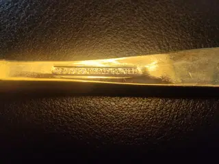 2 teskeer, guldbelagt, 23 karat fra 1970'erne
