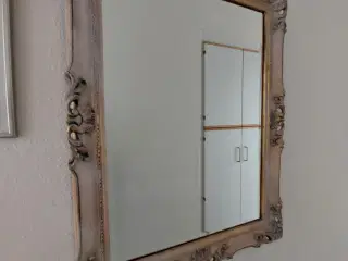 Fazetslebet spejl i smuk ramme
