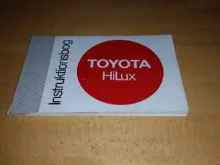Instruktionsbog Toyota Hilux.