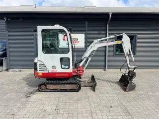 Takeuchi TB 016 Halv automatisk fæste med kipbar planerskovl