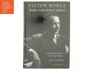 Smilet er den korteste afstand - : erindringer (Bog)