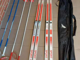 2 par langrend ski med stave og opbevarngspose