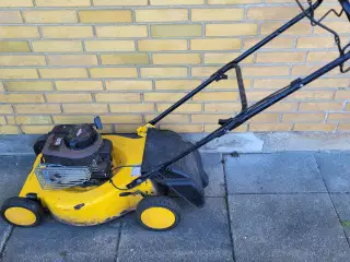 Plæneklipper med træk virker