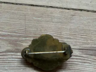 Broche, guldfarvet metal