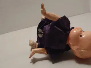 Gammel celluloid kravledukke med optræk. 50´erne