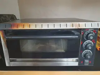 Pizzaovn bager som på pizzariaerne