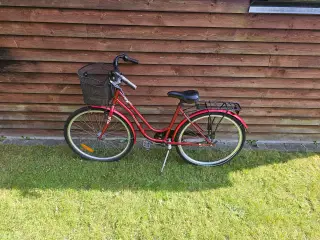 Rød 24" pige cykel til salg