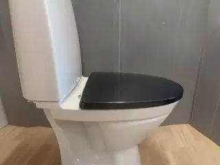 Toilet med p lås med sæde ifø sign. Ubrugt ( annon