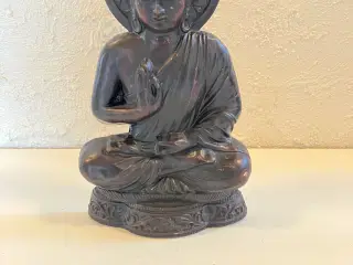 Buddah i siddende stilling
