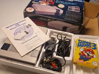 Nintendo NES med supermario 3 og 2 controllers