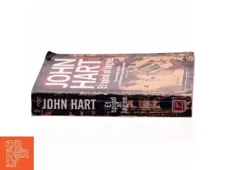 Et spind af løgne af John Hart (f. 1965) (Bog)