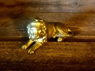 * Smuk løve - i guld/bronze