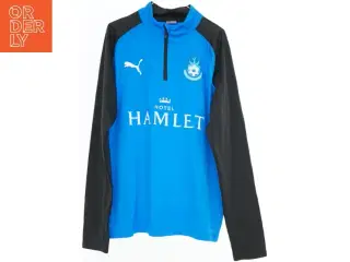 Sportstrøje med sponsorlogoer fra Puma (str. 164)