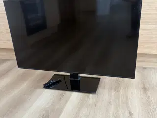 43” Samsung TV i flot stand 