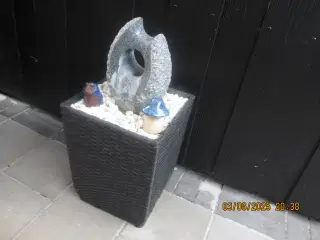 springvand i granit